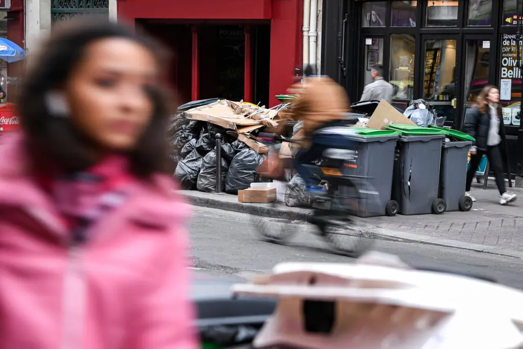City street lined with waste.