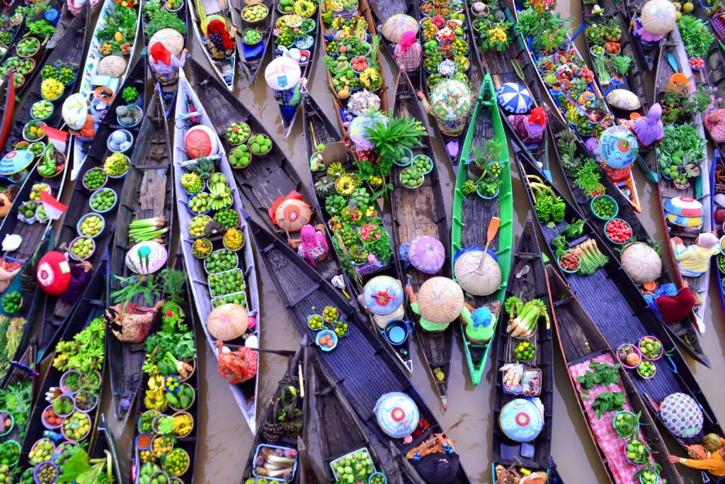 Boats market on the water in Indonesia.
