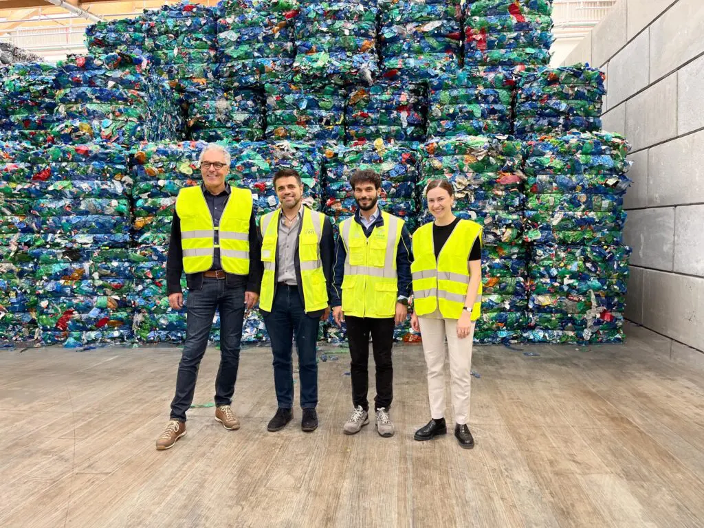 Willi and Julia Stadler (left and right) with Iren's team in the middle.